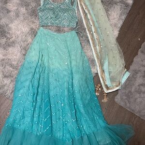 Elegant Blue and Green Embellished Lehenga Set